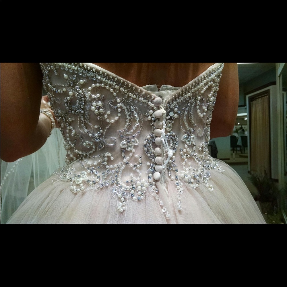 Justin Alexander blush wedding dress